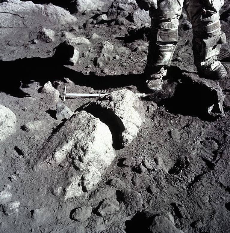 IMAGE OF AN ASTRONAUT'S LEGS IN SPACE BACKGROUND