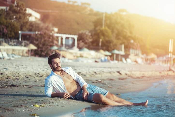 HANDSOME MAN ON THE BEACH